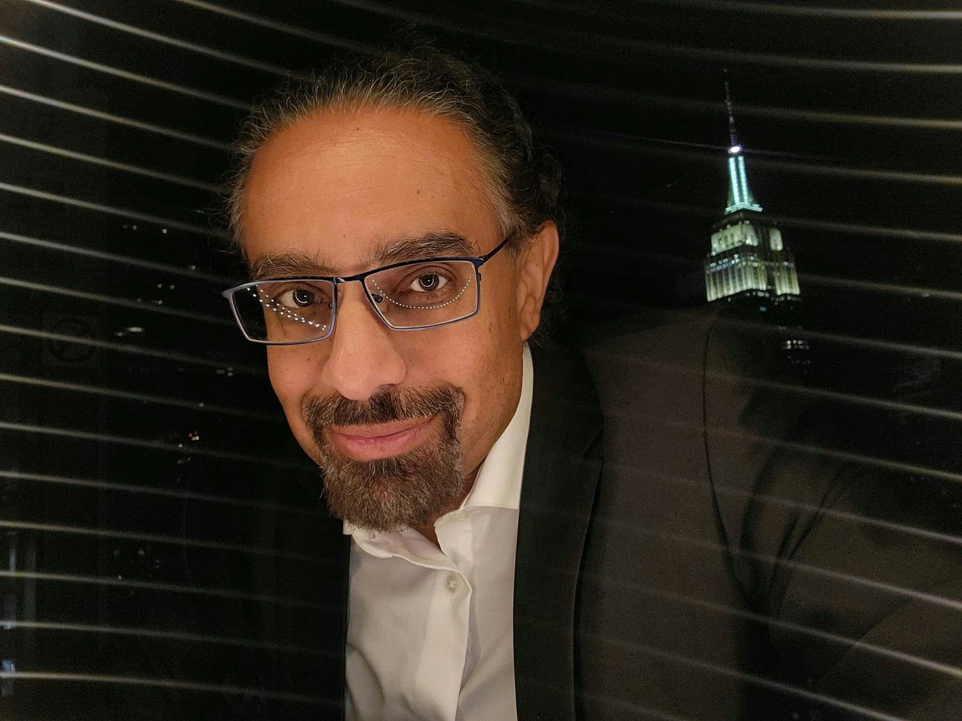 Ramez Naam in New York with the Empire State Building in the background