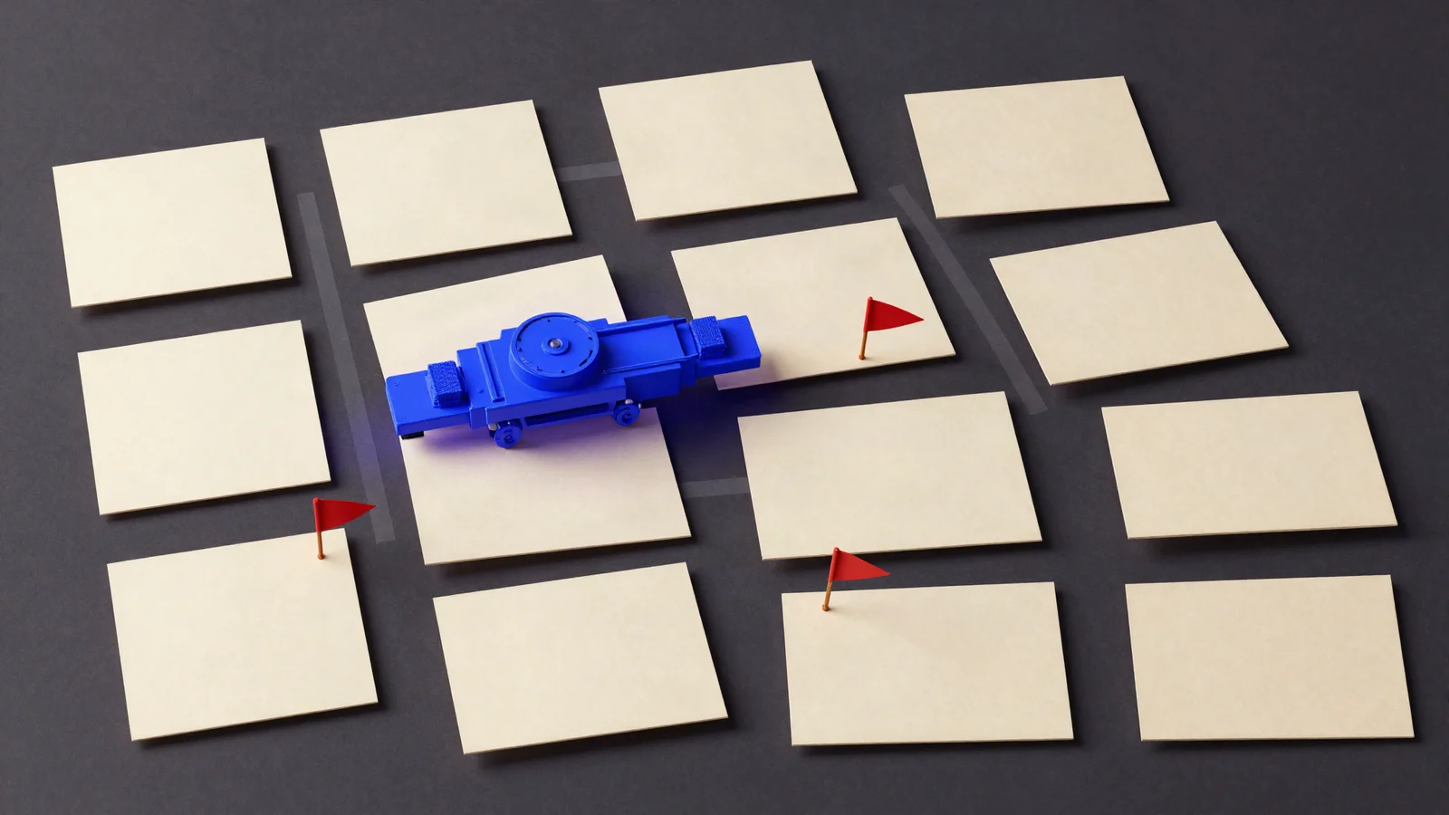 A blue mechanism changes one tile in a field of plain paper tiles, while three red flags mark problems.